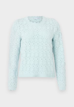 Light blue long-sleeve sweater with a knit honeycomb pattern and scalloped edges at the cuffs and neckline.