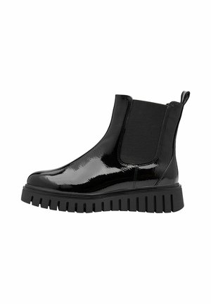 Bottes Chelsea en cuir verni noir avec une semelle épaisse, des panneaux latéraux élastiques et une languette à l'arrière pour un enfilage facile.