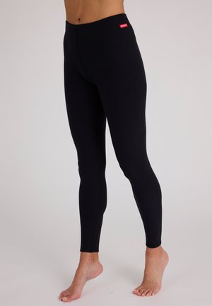 Black leggings with a smooth texture, a high elastic waistband, and minimal stitching. Features a small red logo tag on the waistband.