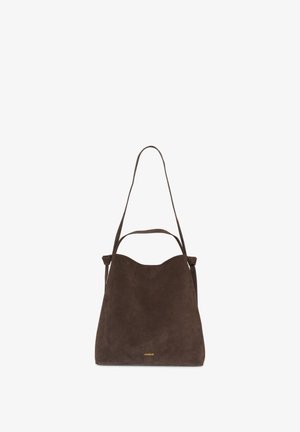 Pruun seemisnahast õlakott, millel on lõõgastunud kuju, pikad rihmad ja alumises osas peen kuldne logo. Sile tekstuur ja minimalistlik disain.