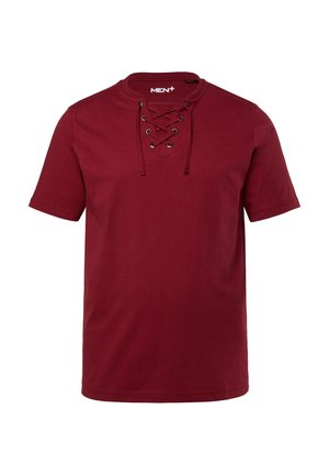 T-shirt corto bordeaux in cotone. Presenta un collo rotondo con un design a lacci e occhielli metallici. Texture liscia.