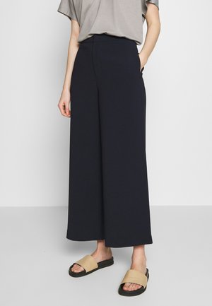 Spodnie materiałowe