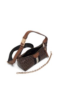 Brown patterned handbag with gold hardware, a long adjustable strap, and a main zip closure. Features a contrasting stripe and a detachable chain.