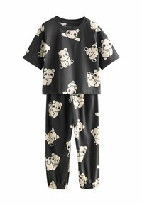 Set di pigiama nero composto da un top a maniche corte e pantaloni con vita elastica, decorato con illustrazioni di panda color crema in tutto il tessuto.