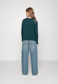 Dr.Denim Petite ECHO - Calças de ganga de corte relaxado - mid blue