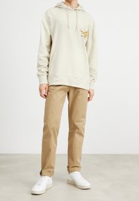 Tommy Jeans Mikina s kapucí - beige