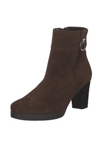 Brown suede ankle boot with a folded cuff and decorative silver buckle. Features a chunky heel and smooth black rubber sole.