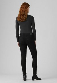 Levi's® ZIP HEM CAMP  - Vaqueros pitillo - soft black