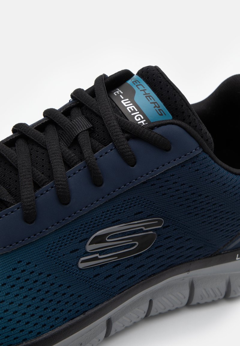 navy blue skechers