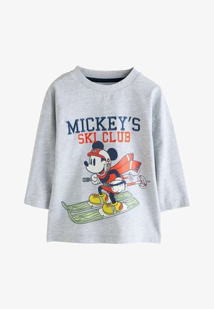Tricou gri cu mânecă lungă, prezentând un personaj de desene animate schiind, cu text albastru și portocaliu "CLUBUL DE SCHI AL LUI MICKEY" și detalii grafice.