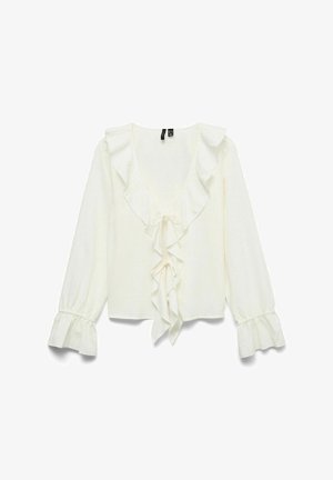 Hosszú ujjú, fehér blúz mély V-nyakkivágással, fodros díszítéssel a nyakkivágás és az elülső rész mentén, megkötős rögzítéssel és fodros mandzsettával.