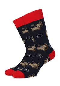 Skarpetki dziane w granatowym tle, z czerwonymi mankietami i palcami, w wzór renifera ze śnieżynkami, wykonane z miękkiego, elastycznego materiału.