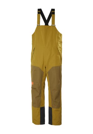 Gelbe und braune isolierte Latzhosen mit schwarzen verstellbaren Schulterriemen und seitlichen Reißverschlusstaschen, für den Außeneinsatz konzipiert.