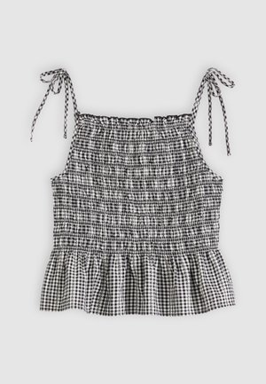 Αμάνικο τοπ μαύρο-άσπρο καρό gingham με ελαστική εφαρμοστή μπροστινή όψη, κορδόνια για δέσιμο και βολάν στο τελείωμα.