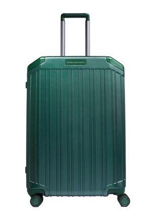 Grüner Hartschalenkoffer mit vertikalen Rillen, vier drehbaren Rollen und ausgezogenem Teleskopgriff.