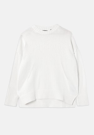 White knitted sweater with a round neck, long sleeves, and side slits. Features a subtle embossed logo on the front and ribbed cuffs.