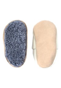 Weiche Lederstiefel mit grauem Plüschfutter auf einer Seite und einer glatten beigen Außenseite auf der anderen. Strukturierte Sohlen für besseren Halt.