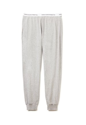 Pantalones de chándal grises hechos de una tela suave, presentan una cintura elástica con ribetes blancos de marca y puños acanalados en los tobillos.