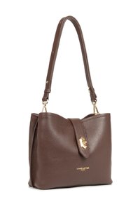 Brown leather handbag with a textured surface, gold hardware accents, and a flap closure. Features an adjustable shoulder strap.