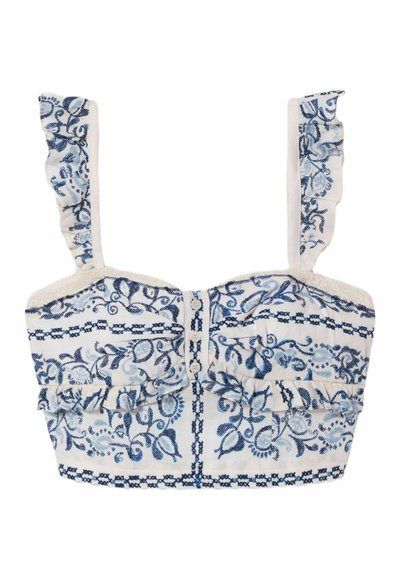 Top corto bianco con ricamo floreale blu, bottoni frontali, spalline arricciate e dettaglio a volant sotto il busto.