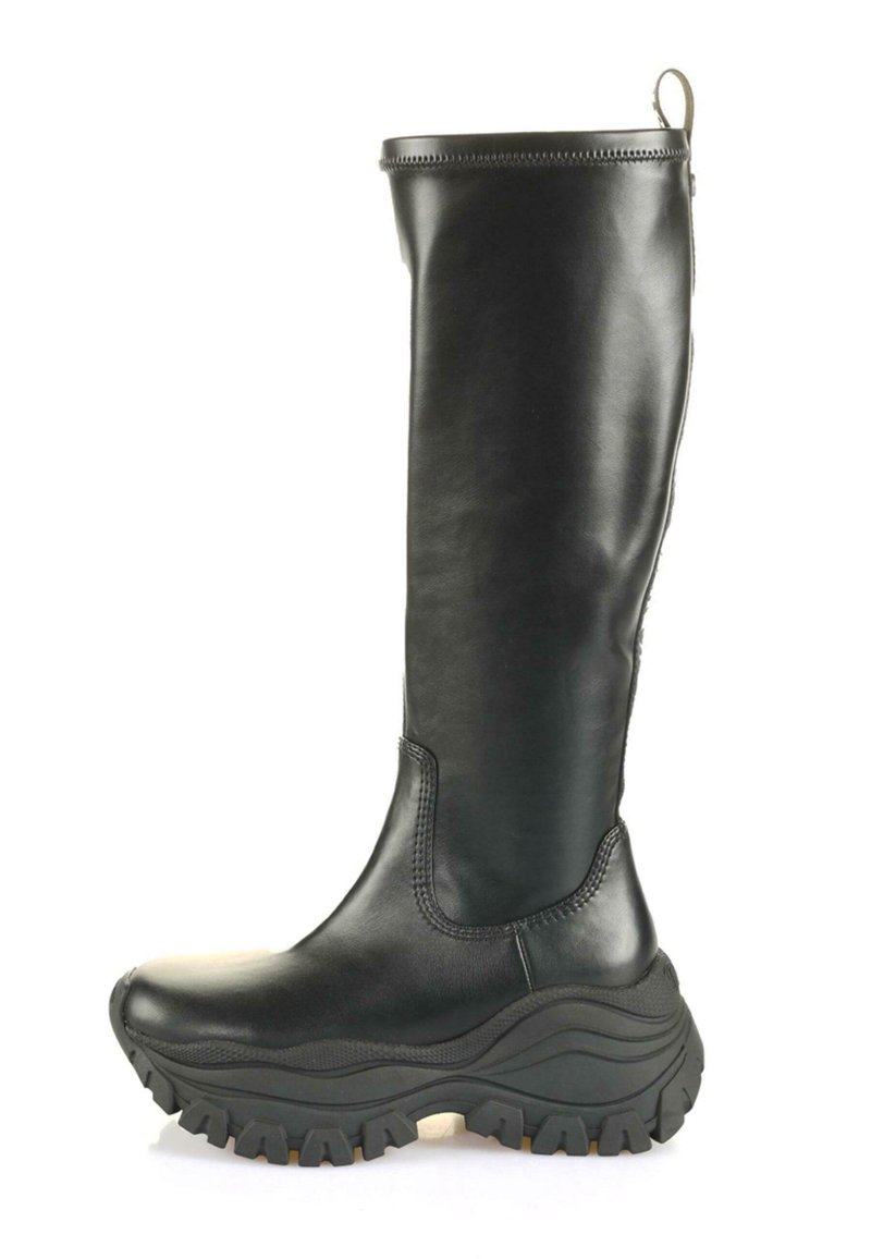 Black leather knee-high boot with a textured rubber sole, curved design, and a pull tab at the back for ease of wearing.