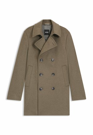Bruine wolmix peacoat met een dubbelzijdige voorkant, geknipt kraag, twee zijzakken en grijze knopen. Gevoerde binnenkant.