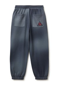 Donkergrijze sweatpants met een gradientpatroon, elastische tailleband, twee zijzakken en een driehoekige logopatch op de rechterzak.