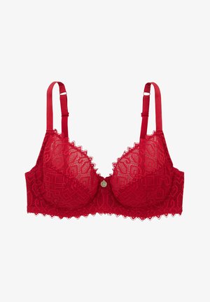 Soutien-gorge en dentelle rouge présentant des motifs géométriques, des bretelles ajustables, un bord festonné et un ornement central décoratif en ton doré.