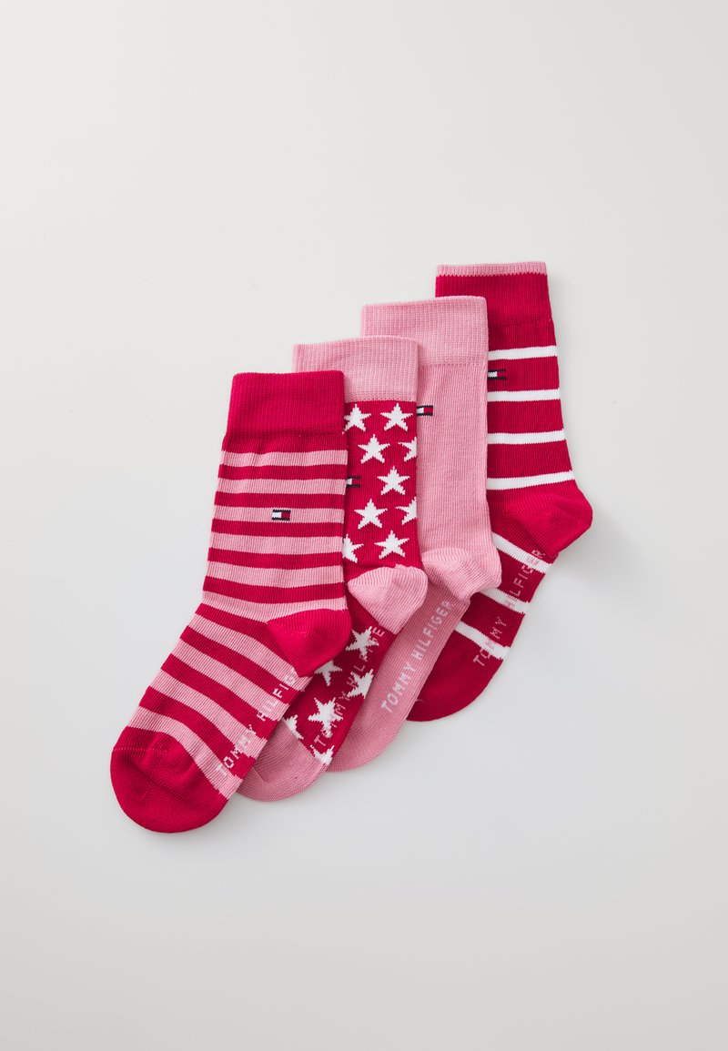 Set di quattro calzini rosa con vari design: due a strisce, uno con stelle e uno tinta unita. Realizzati in un materiale morbido e elasticizzato.