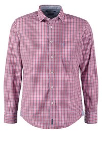 Chemise à manches longues à carreaux rouges, blancs et bleus avec un col pointu et une poche poitrine avant.