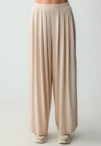 Pantaloni - beige