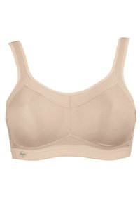 Beige sports bra with mesh detailing, adjustable straps, and a wide band. Features reinforced seams for support and a logo tag at the bottom.