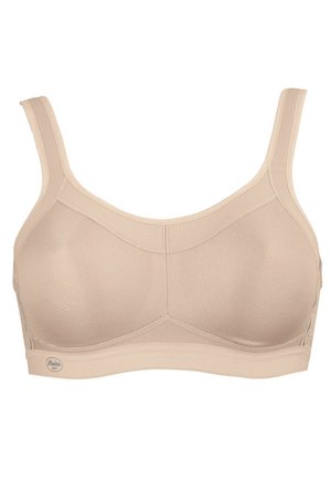 Beige sports bra with mesh detailing, adjustable straps, and a wide band. Features reinforced seams for support and a logo tag at the bottom.