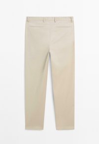 Beige slim-fit trousers with belt loops, two back welt pockets, and a plain waistband, shown from the back on a white background.