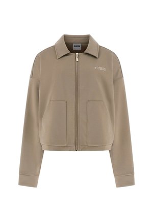 Giacca cropped con zip beige, con colletto, due tasche frontali, logo ricamato sul petto, realizzata in tessuto morbido.