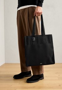 UNISEX - Shopping bag - black