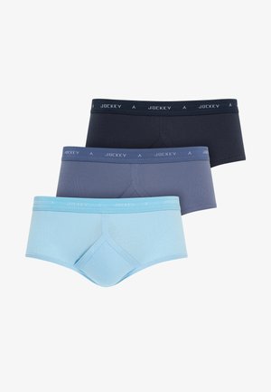 Drie paar Jockey slips in donker marineblauw, gedempt blauw en lichtblauw. Ze hebben elastische taillebanden met logo en een strakke pasvorm. Van katoenmix materiaal.