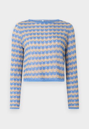 Pull long à manches longues, court, avec un motif en zigzag bleu et or. Confectionné dans un tissu transparent et texturé. Présente un col rond.