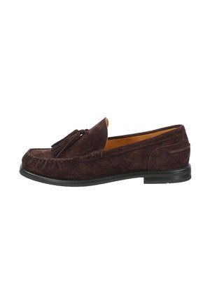 Dunkelbrauner Wildleder-Slipper mit Quasten, Steppnähten und niedrigem schwarzem Gummabsatz.