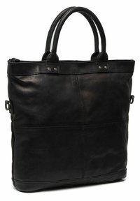 Mustat nahkaiset olkalaukut, joissa on kaksinkertaiset kahvat, hienovarainen ommel ja metalliset niittikoristeet. Ominaisuuksina suorakulmainen muoto ja sileä pinta.