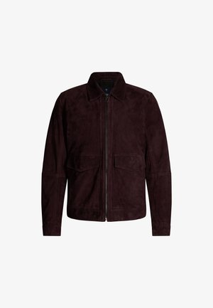 Burgunderfarbene Wildlederjacke mit Reißverschluss, spitzem Kragen und zwei Fronttaschen. Hat eine strukturierte Oberfläche und einen lockeren Schnitt.