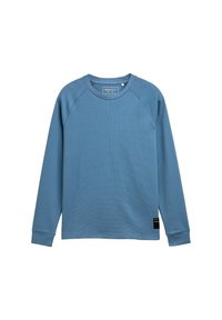 Blaues Langarmhemd aus strukturiertem Stoff mit Rundhalsausschnitt und Raglanärmeln. Mit einem schwarzen Label an der unteren linken Seite.