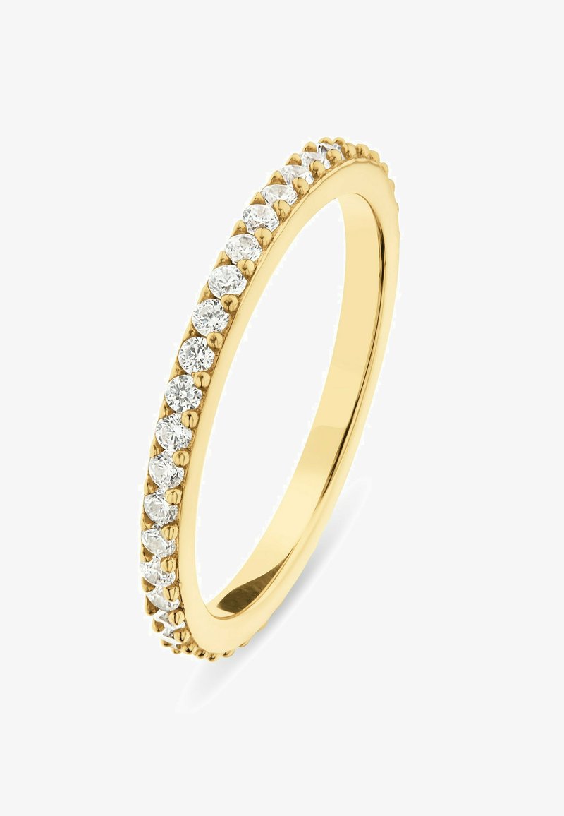 Gold ring featuring a row of round diamonds along the band, showcasing a smooth finish and thin, curved shape for a delicate appearance.