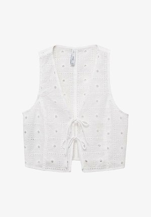 Witte mouwloze top van een gestructureerde stof met vierkante patronen en cirkelvormige uitsparingen, aan de voorkant gestrikt met een witte koord.