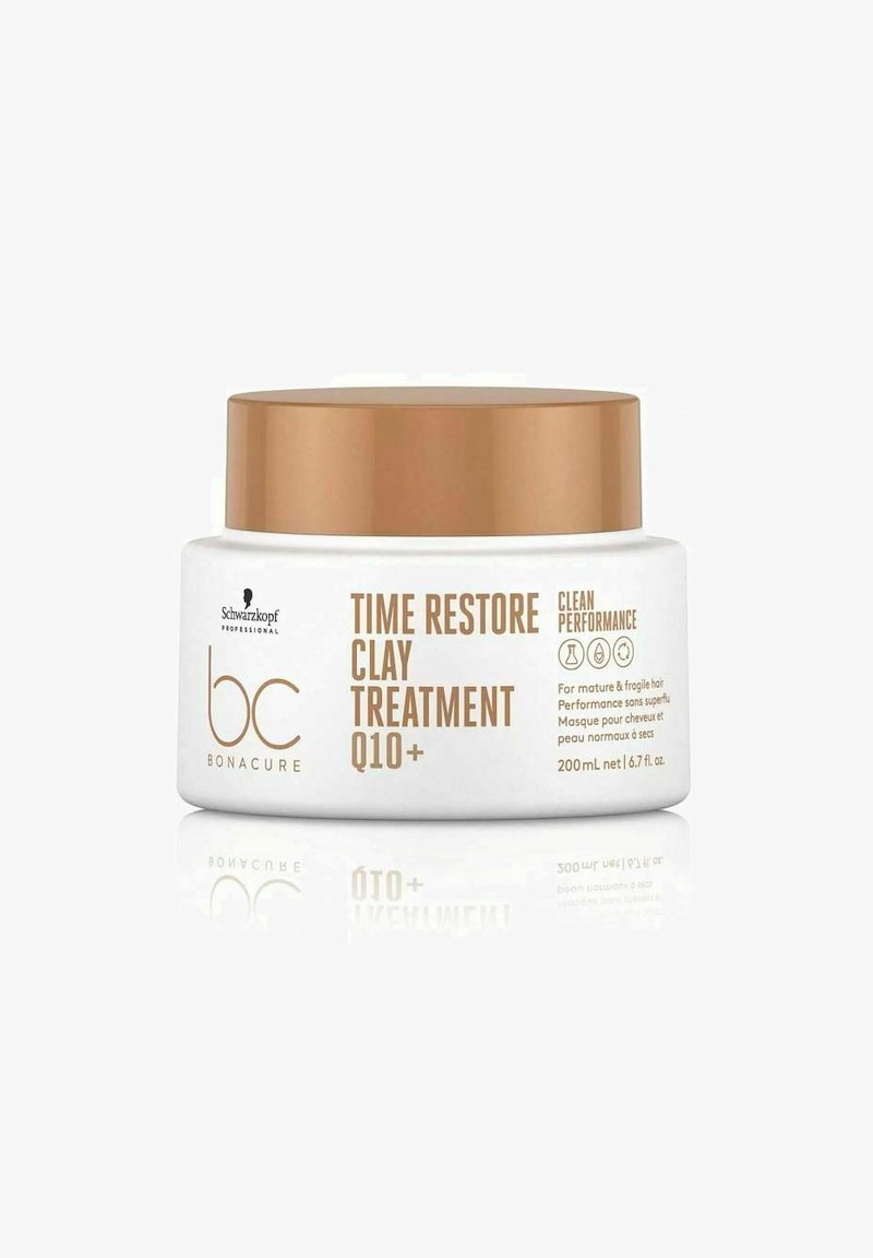 Barattolo bianco rotondo con un coperchio dorato. L'etichetta riporta "Trattamento all'argilla Time Restore Q10+" e include i dettagli del prodotto. Capacità: 200 mL.