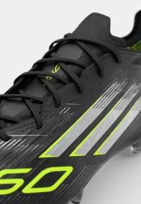 adidas Performance F50 ELITE SG - Soft-ground football boots - core black/iron metallic/lucid lemon