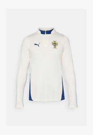 Puma garā piedurkne jaka krēmkrāsā ar ziliem sānu paneļiem. Iezīmēta ar pusi-izvilkumu apkakli un izšūtu zīmodziņu uz krūtīm. Tekstūrēta auduma.