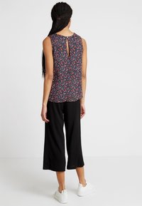 Vero Moda Housut - black