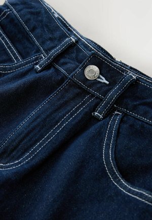Dark blue denim jeans with white stitching, a front metal button closure, and a smooth texture. Features a standard waistband and pockets.