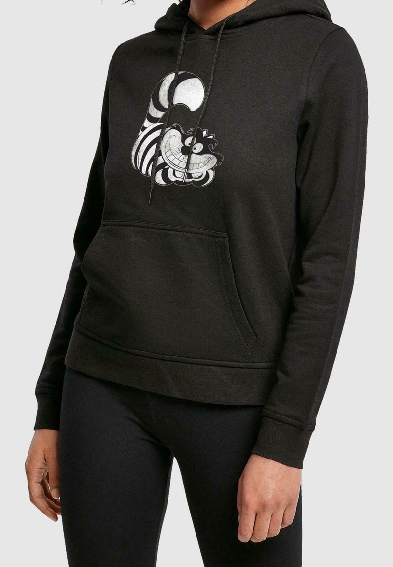 Zwarte hoodie gemaakt van katoenmix. Voorzien van een voorkantzak en een grafische print van een glimlachend personage in wit en grijs op de borst.